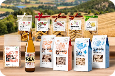 Selezione di prodotti alimentari artigianali confezionati